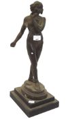 A cast figure of a continental naked female figure,