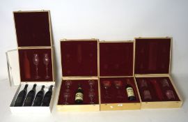 A group of boxed German lead crystal glasses,