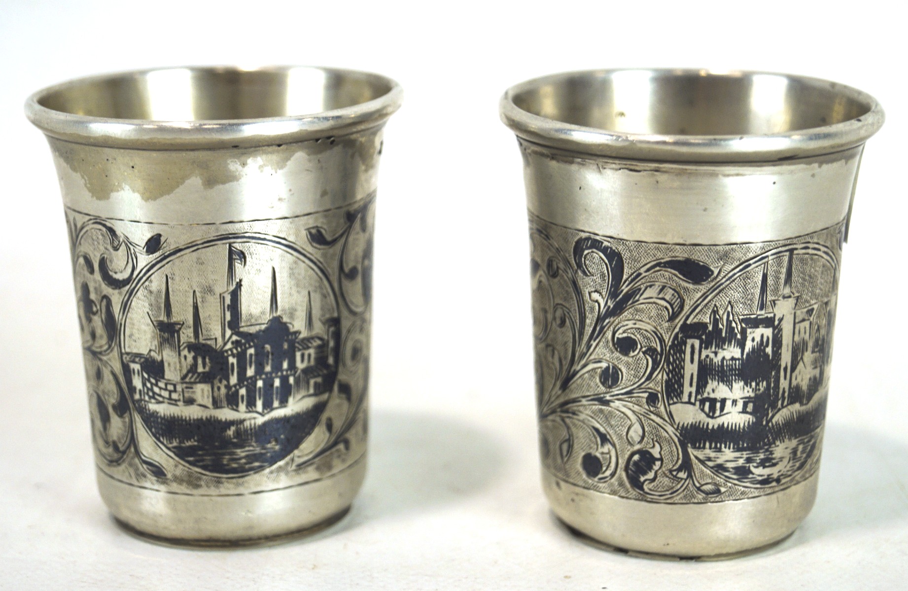 A pair of Russian engraved beakers, stamped 'AA', height 6.