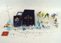 A selection of glass figures and animals, including pieces by Swarovski,