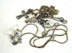 A collection of silver and white metal jewellery, including necklaces, earrings,