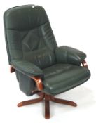 A vintage green leather reclining swivel chair,