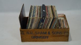 A collection of vinyl singles, including pieces by Fred Wedlock, Horslips, Justin Hayward and more,