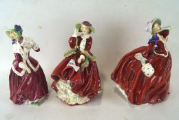 Three early Royal Doulton ceramic figures of ladies, comprising; Christmas morn HN 1992,