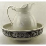 A matched ceramic wash bowl and basin,