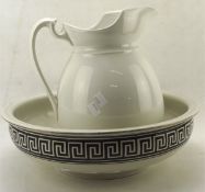 A matched ceramic wash bowl and basin,