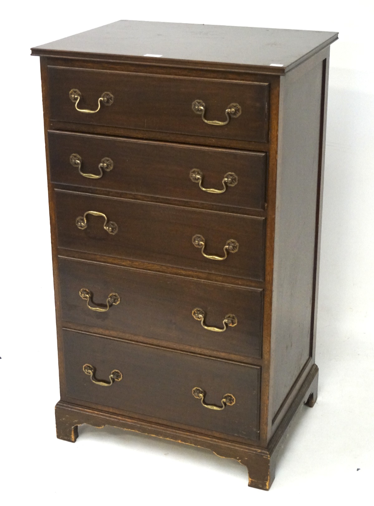 A 20th century mahogany chest of drawers by Waring & Gillow ltd, with label to top draw,