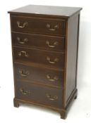 A 20th century mahogany chest of drawers by Waring & Gillow ltd, with label to top draw,