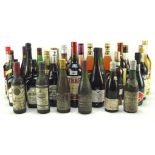 A quantity of assorted alcohol including a bottle of VO KW brandy, wine, liqueur and more,
