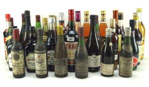 A quantity of assorted alcohol including a bottle of VO KW brandy, wine, liqueur and more,