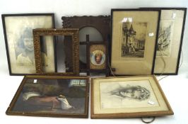 A group of vintage pictures and frames including etchings of city scenes, a drawing of a lady,