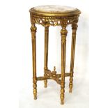 A 20th century gilt wood jardiniere stand, of circular form, with marble top,