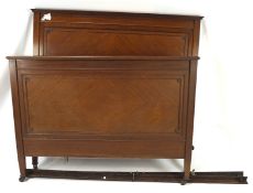 An Edwardian mahogany double bed frame,