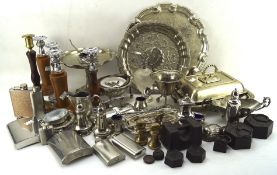 A collection of silver plated wares, including trays, lidded dishes, sauce bowls, candlesticks,