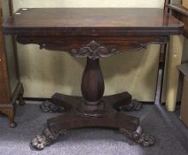 A William IV rosewood fold over games table,