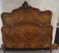 A continental style walnut Queen size double bed,