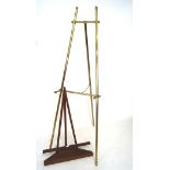 Two artists easels, the largest being metal, approximately 160cm high,