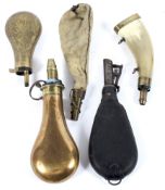 A selection of four 19th century powder and shot flasks,