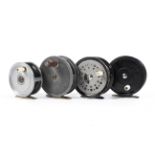 Four 20th century metal fly fishing reels,