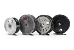 Four 20th century metal fly fishing reels,