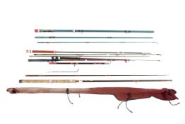 A selection of assorted fishing rods,