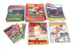 A collection of vintage football magazines,