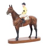 A large Beswick ceramic figure depcting a racehorse 'Arkel', with Pat Taaffe up,