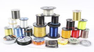 A collection of assorted fishing spools,