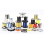 A collection of assorted fishing spools,