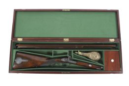 T. Cook Jr Shepton Mallet single barrel percussion muzzleloader, .50 calibre with powder flask.