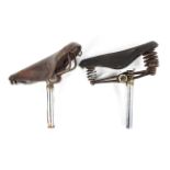 Two vintage Brooks push bike saddles,