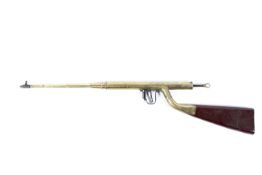 An unusual homemade vintage brass air rifle, with wooden stock, 108cm long.