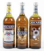 Three bottles of Ricard, one being a limited edition,