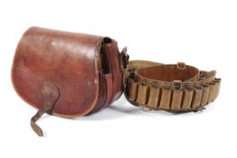 A vintage leather shotgun cartridge holster and a leather satchel bag