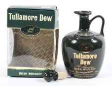 A Tullamore Dew Irish Whiskey ceramic decanter celebrating the Millenium, 1829-2000,