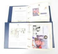 Two folders containing The Queen's Golden Jubilee Commemorative Coin Cover Collection