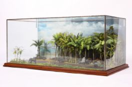 A large glass cased military diorama of the South East Asian theatre,