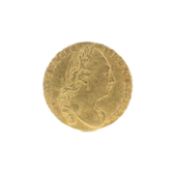 A 1786 George III gold full guinea coin