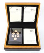 An Emblems of Britian proof gold set, comprising: £1, 50p, 20p, 10p, 5p, 2p & 1p coins, 84.