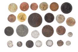 A small collection of assorted coins, including a 1924 Exhibition medallion,