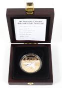 A Guernsey 2009 gold £5 coin,