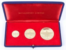 Three gold 18ct medallions, 61.