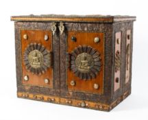 An Indian style wooden and brass, copper and agate mouted table top cabinet,
