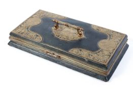 A fine Victorian tool leathered and brass mounted silk lined articulated glove box with carrying