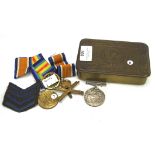 A collection of medals and other items,