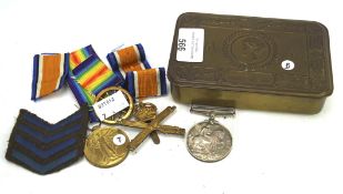 A collection of medals and other items,