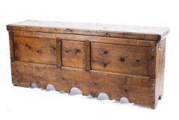 A large 19th pine coffer with panelled front and skirt,
