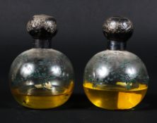 Two silver topped Mappin and Webb glass scent bottles, hand painted with garlands of flowers, 12.