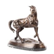 A large bronze sculpture of a horse, 20th century, standing with its front right leg raised,