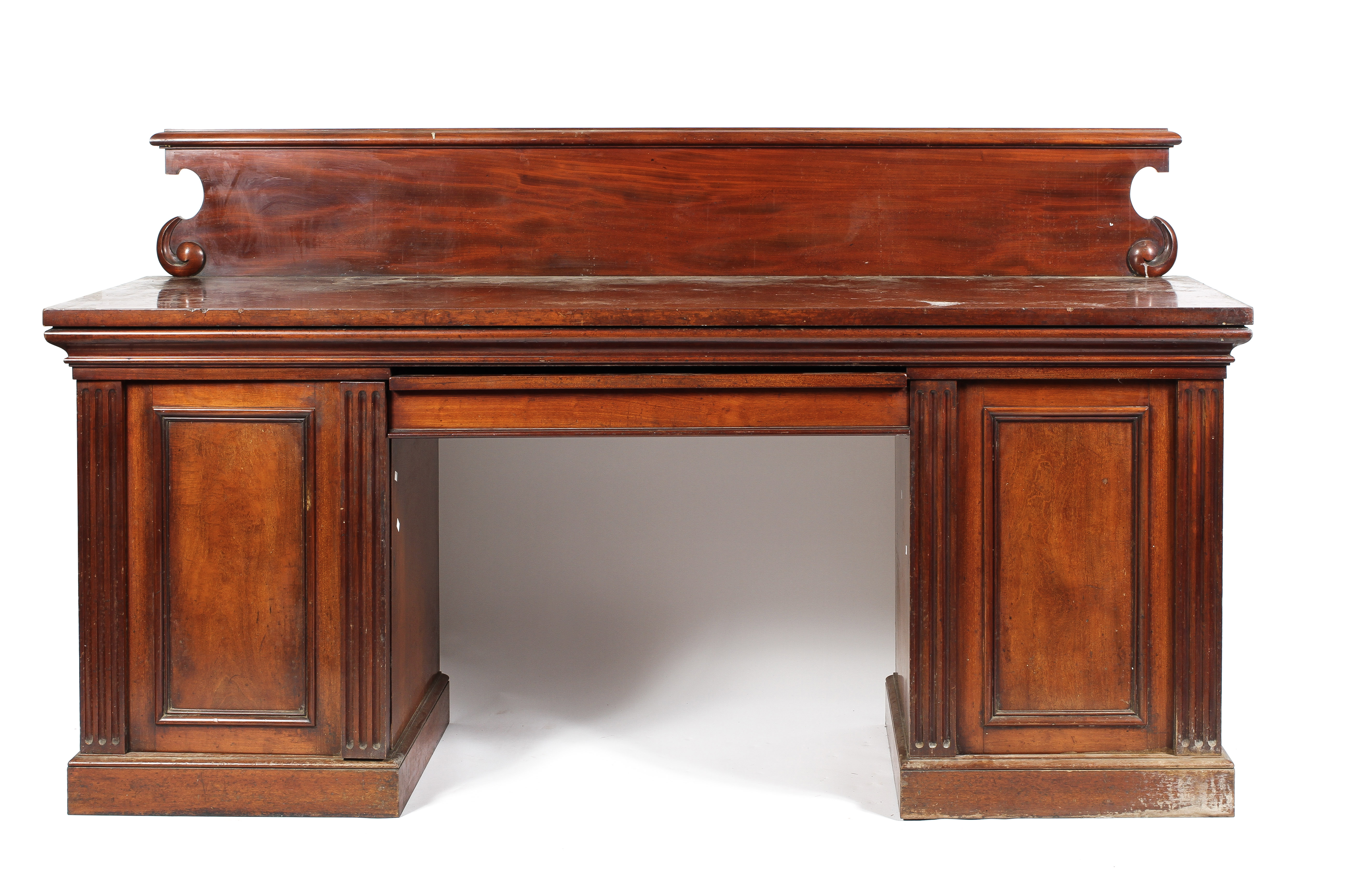 A Victorian mahogany pedestal sideboard with gallery back and central frieze drawer flanked by two